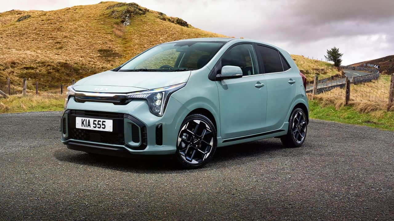 Kia Picanto parked by the road in the countryside