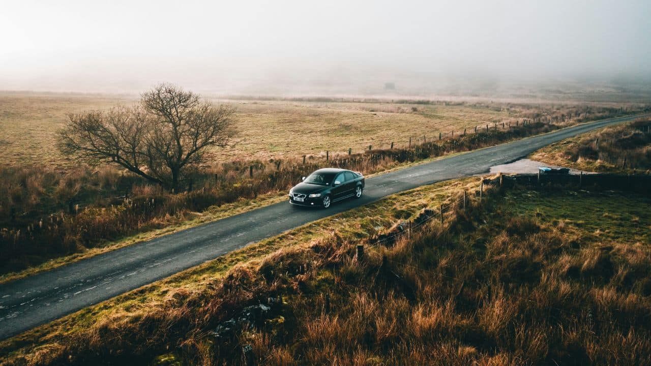 Car driving through the British countryside