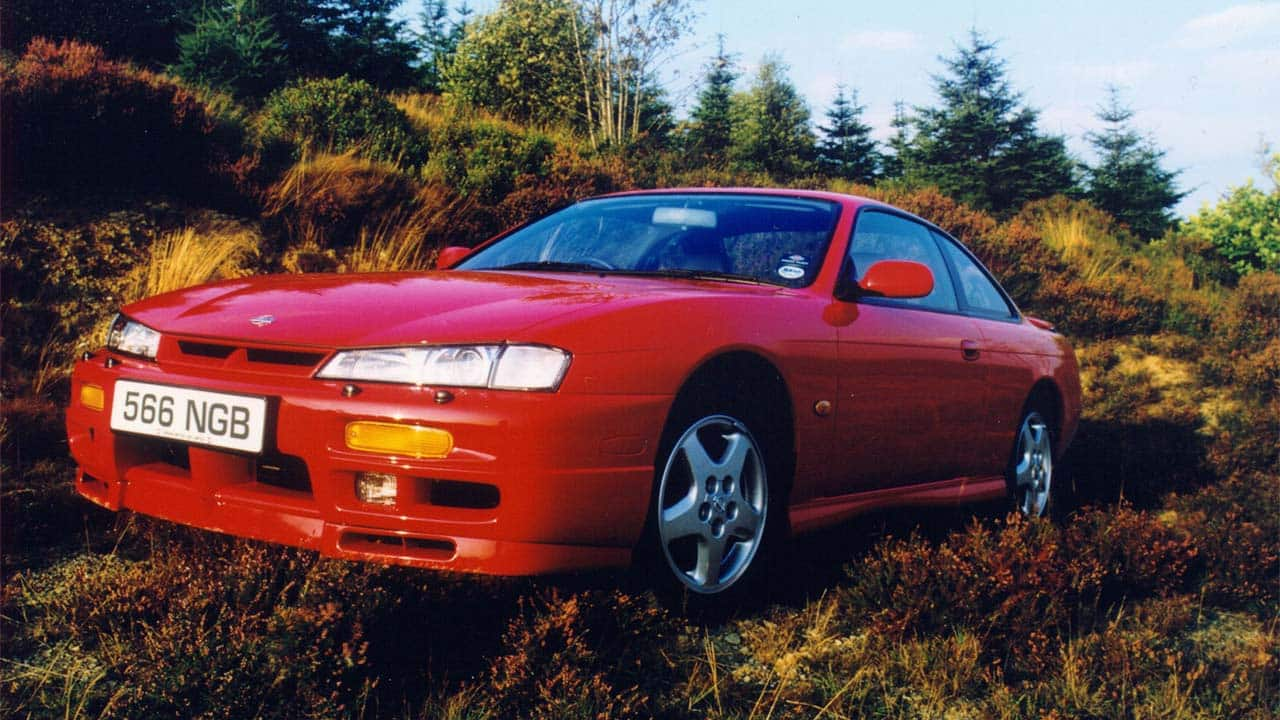 Red Nissan 200SX, front quarter shot