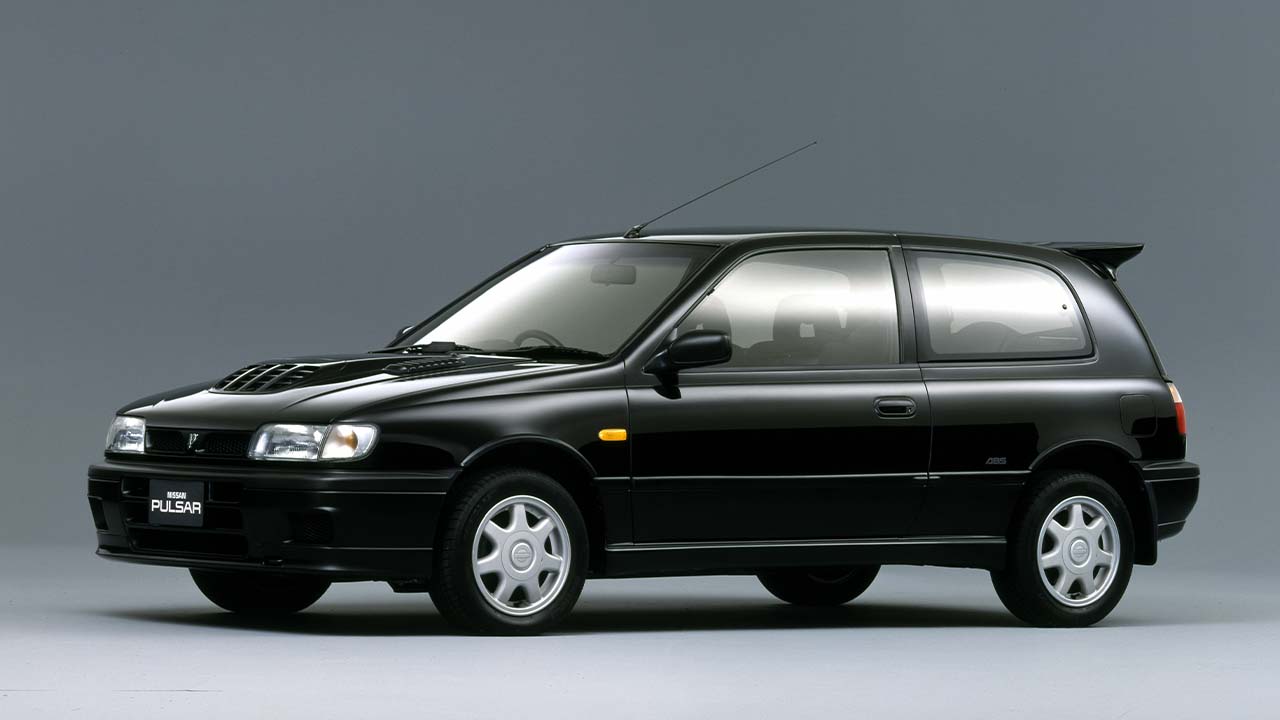 Black Nissan Pulsar GTI-R, parked in a studio