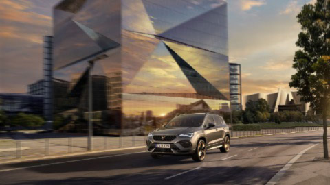 Cupra car driving on an empty beautiful road