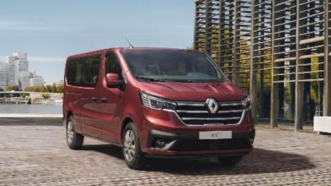 Red Renault Trafic parked by the ocean