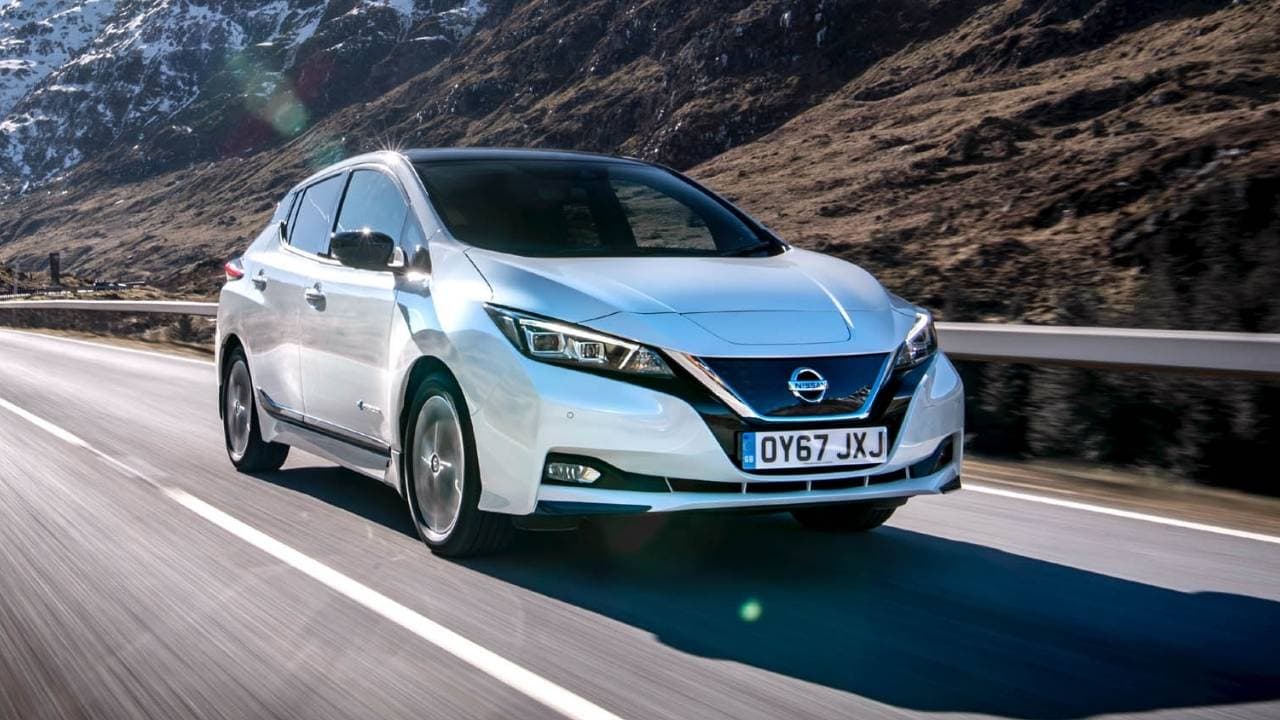 White Nissan LEAF driving in a motorway