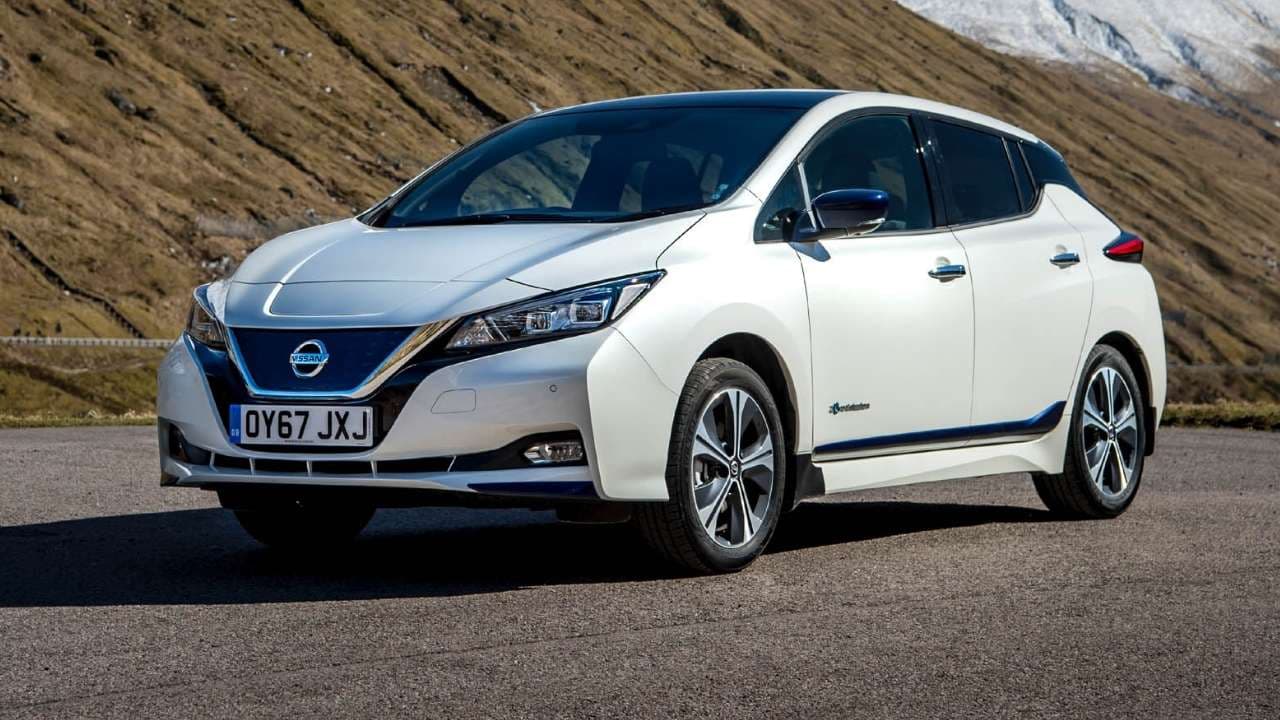 White Nissan LEAF driving in a motorway