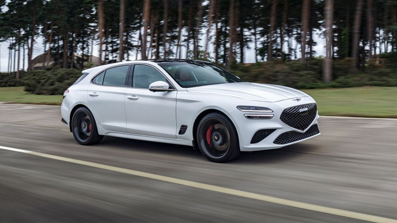White Genesis G7 driving on the motorway