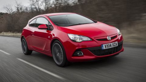 Red Vauxhall Astra driving on the motorway