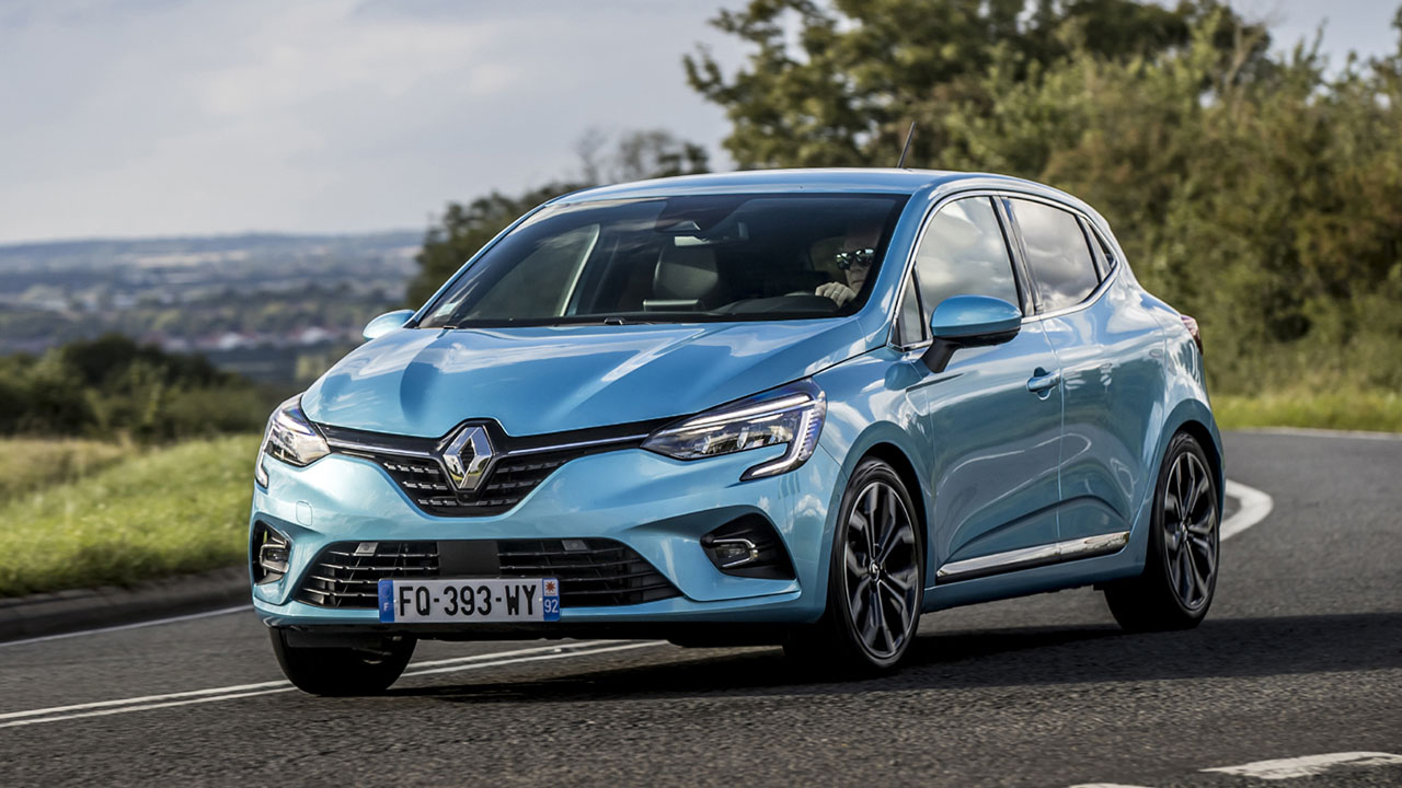 Blue Renault Clio driving