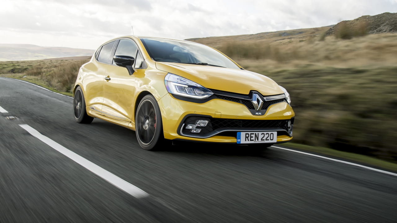 Yellow Renault Clio IV Renault Sport Driving