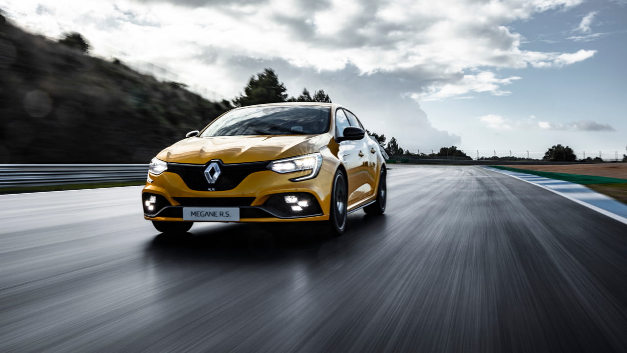 Yellow Renault Megane IV Renault Sport Driving