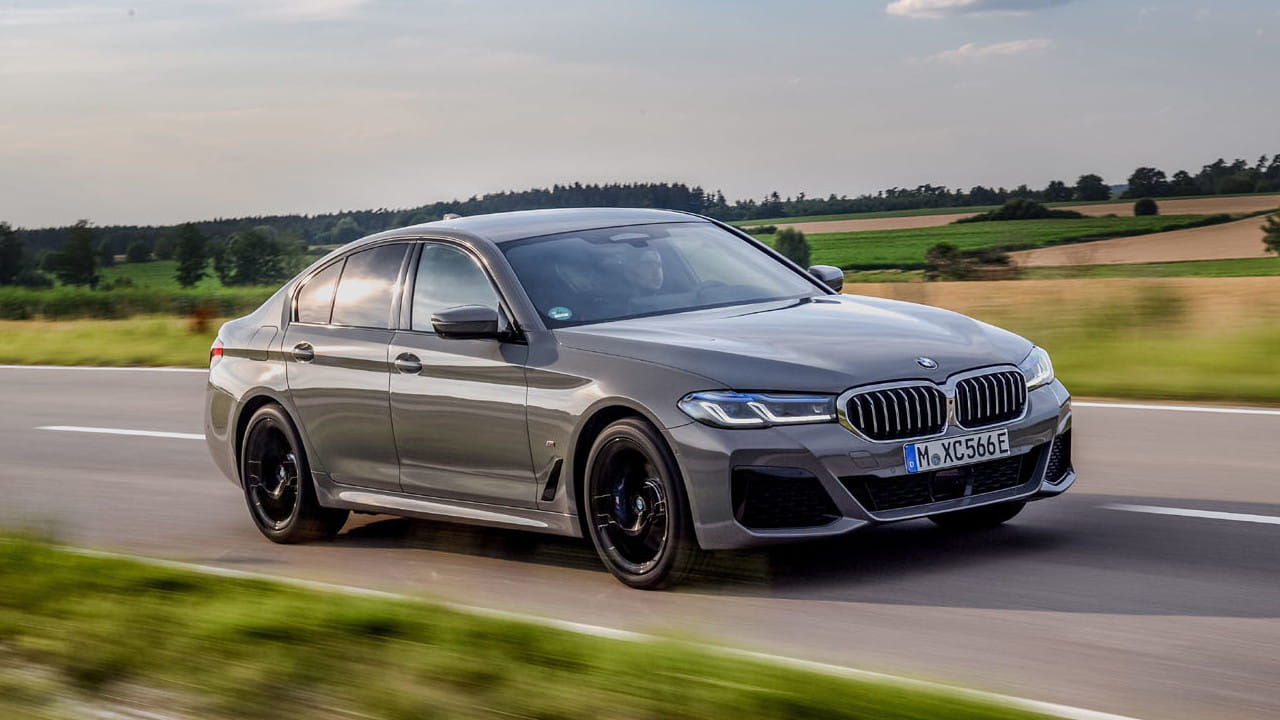 Grey BMW 5 Series Exterior Front Driving