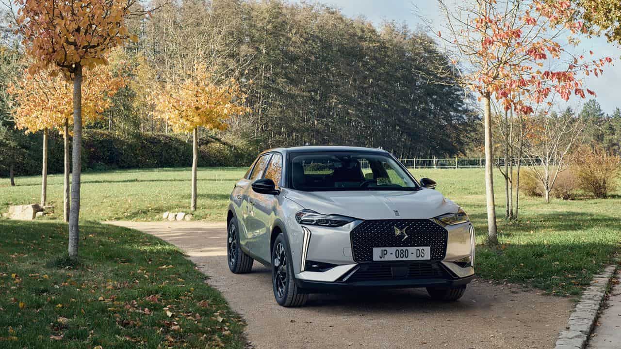 Silver DS 3 parked in a park