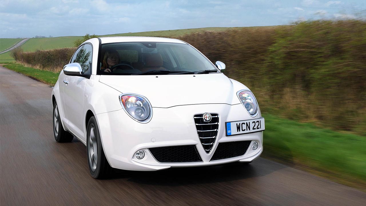 White Alfa Romeo, driving