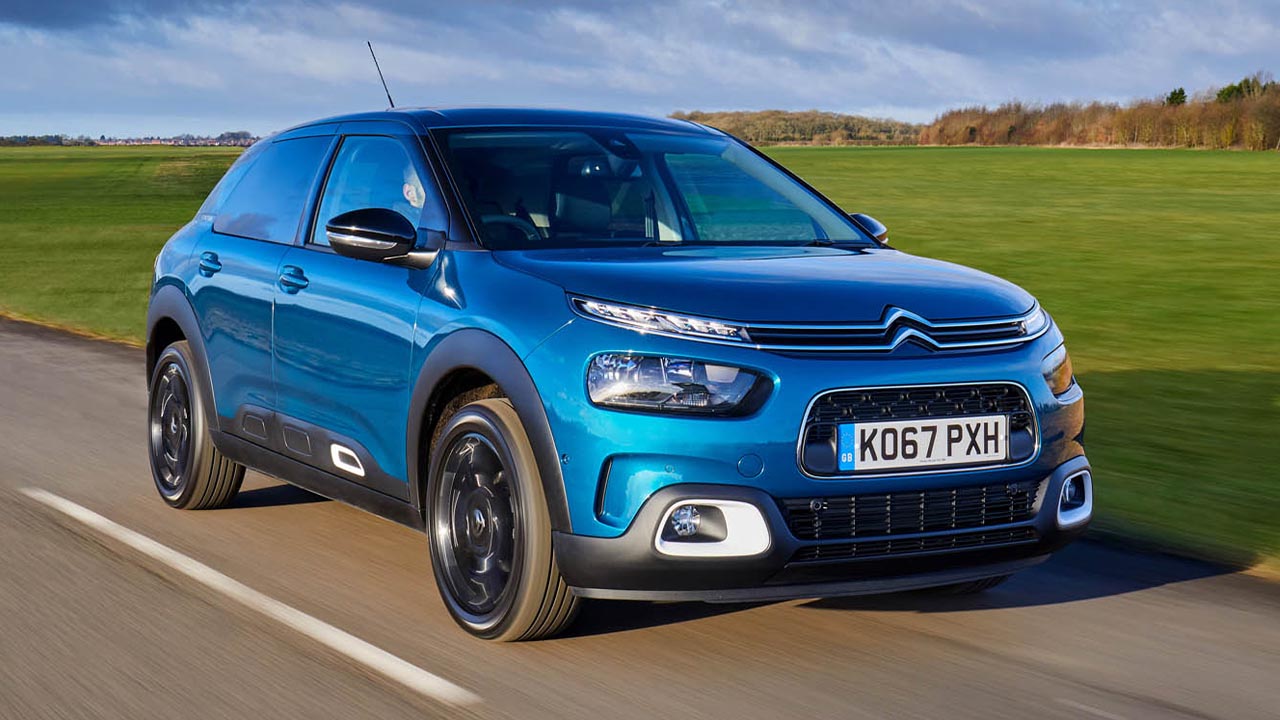 Blue Citroen C4 Cactus, driving