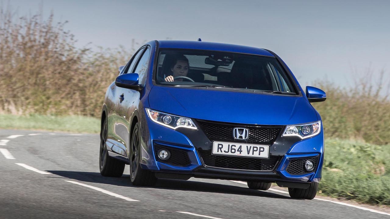 Blue Honda Civic, driving