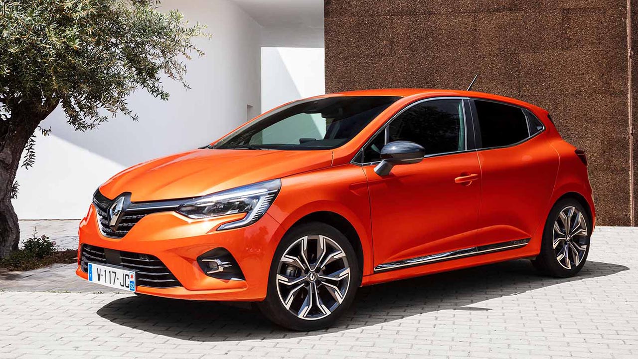 Orange Renault Clio, parked