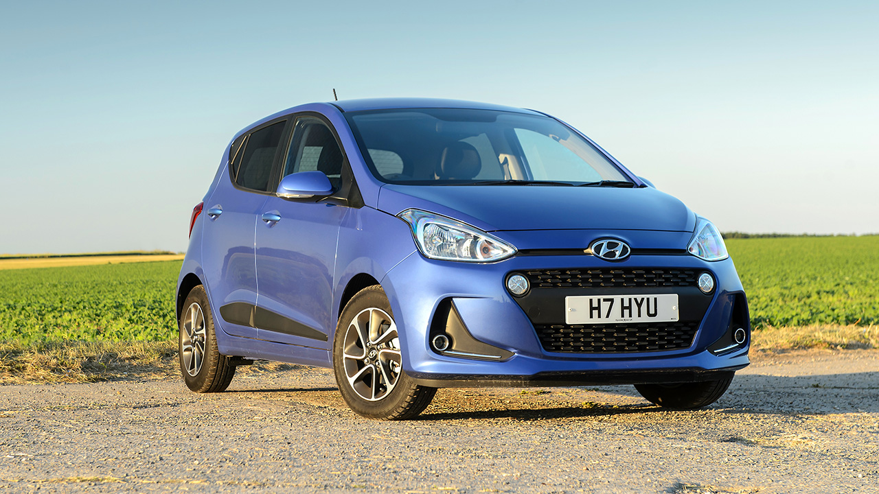 Blue Hyundai i10, parked