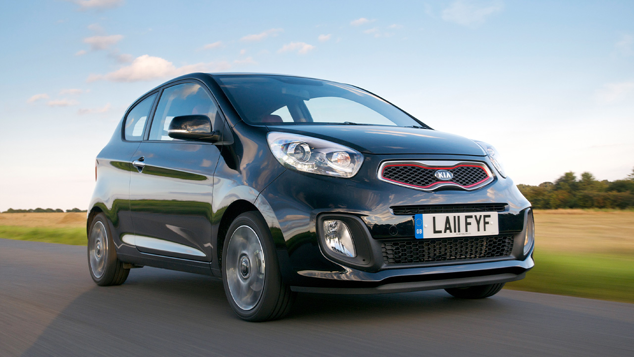 Black Kia Picanto, driving