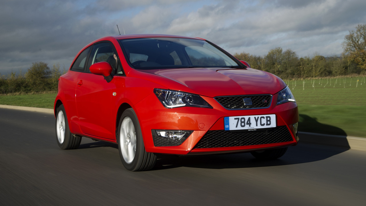 Red SEAT Ibiza, driving