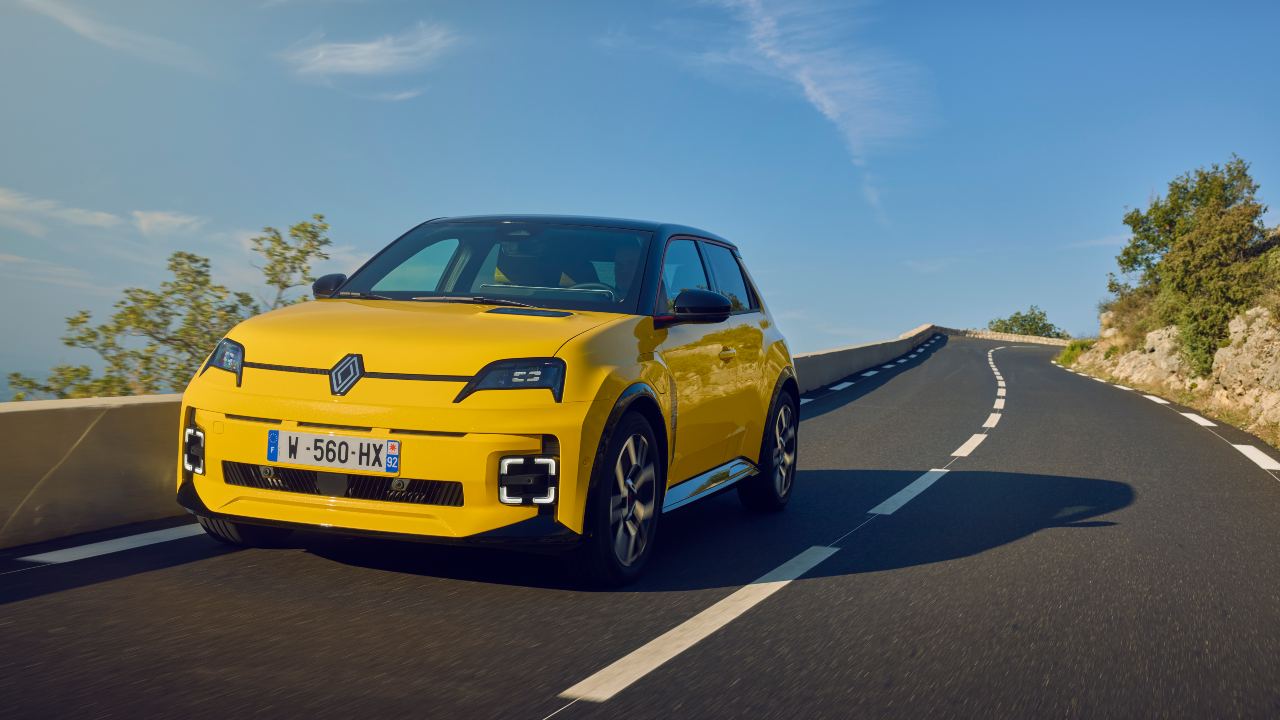 Renault 5 driving yellow front