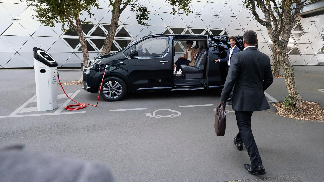 Citroen Spacetourer with side open and person walking towards it
