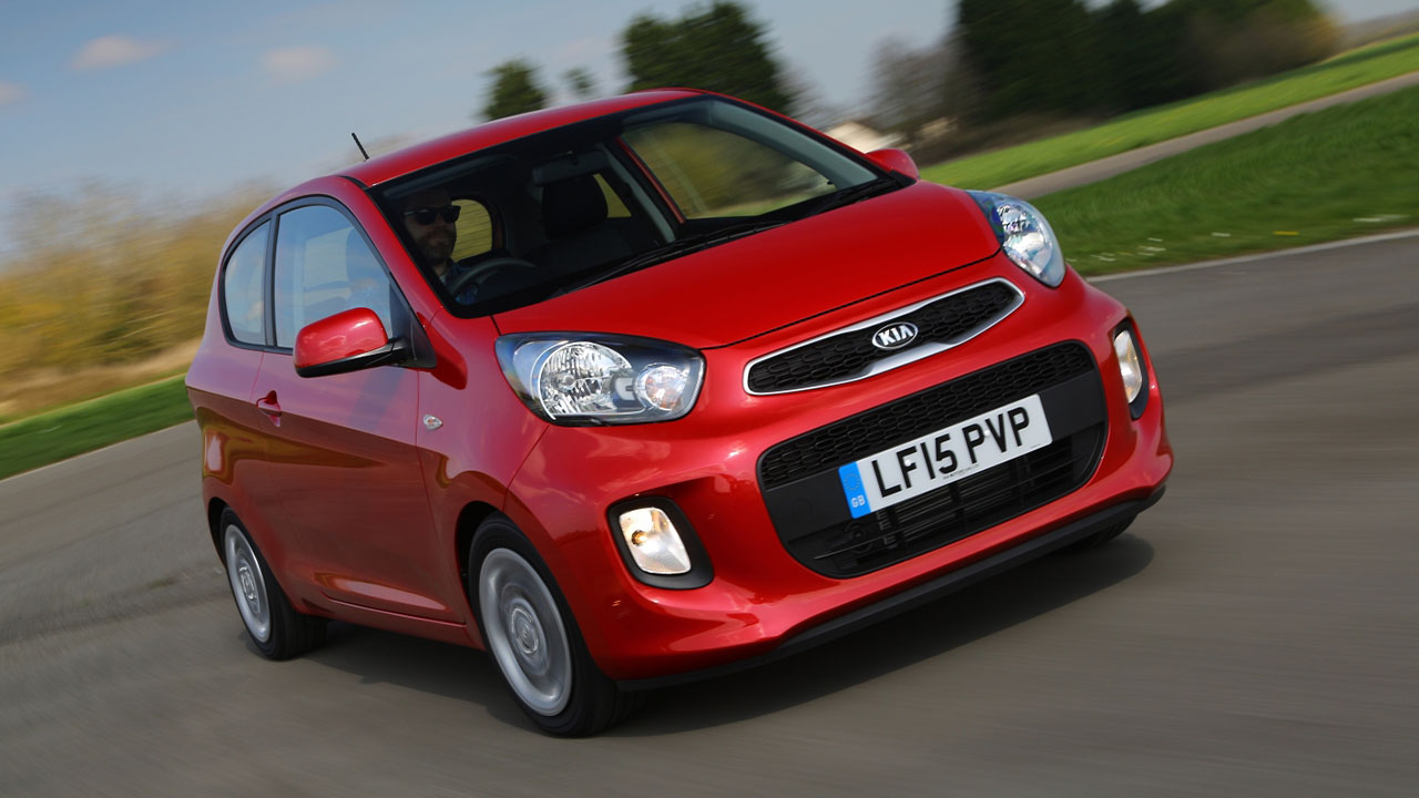 Red Kia Picanto, driving