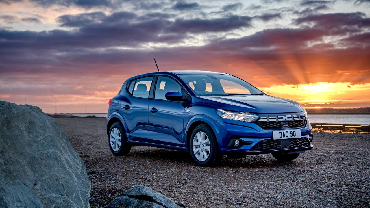 Dacia Sandero blue at sunset