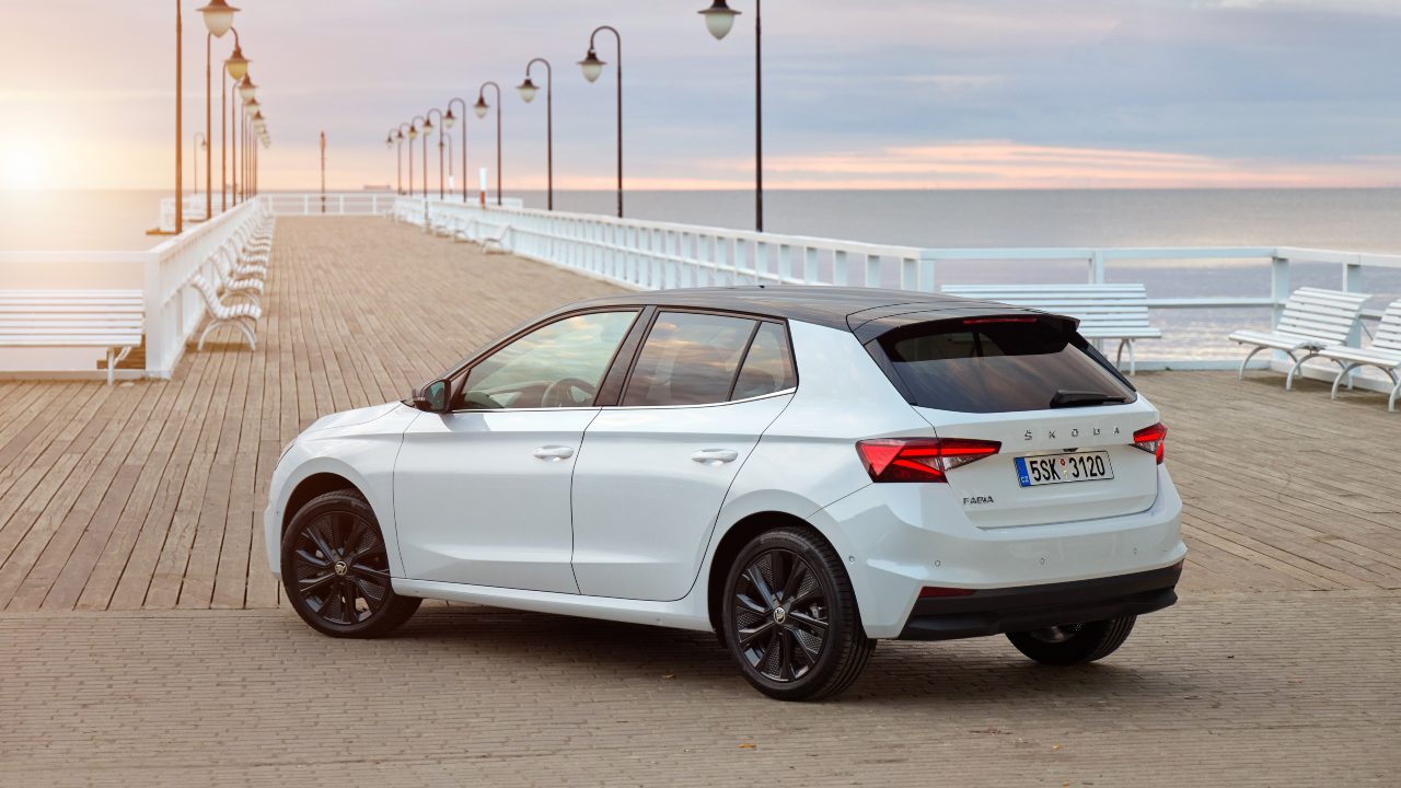 Skoda Fabia white parked on pier