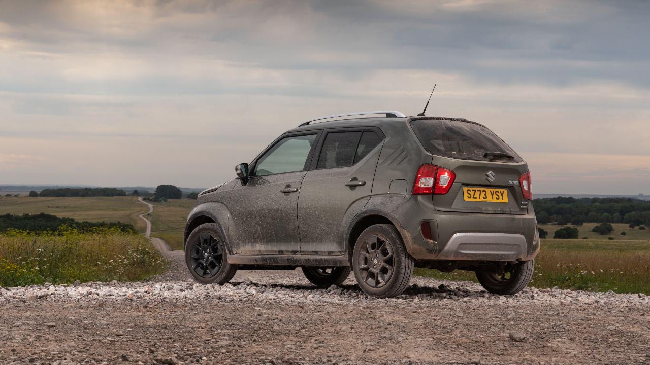 Muddy Suzuki Ignis parked rear