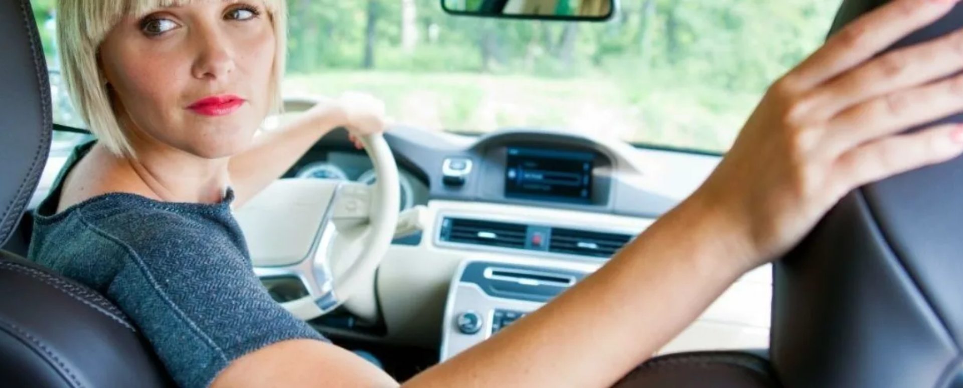 Woman Completing Reverse Parking Manoeuvre