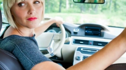 Woman Completing Reverse Parking Manoeuvre