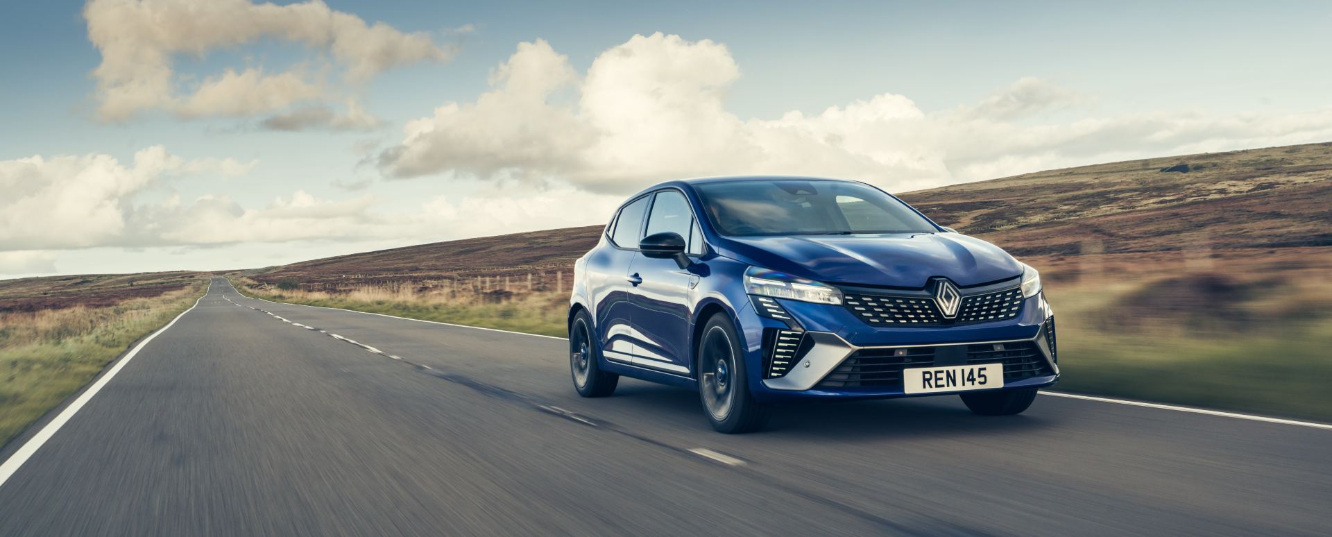 Blue Renault Clio Exterior Front Driving