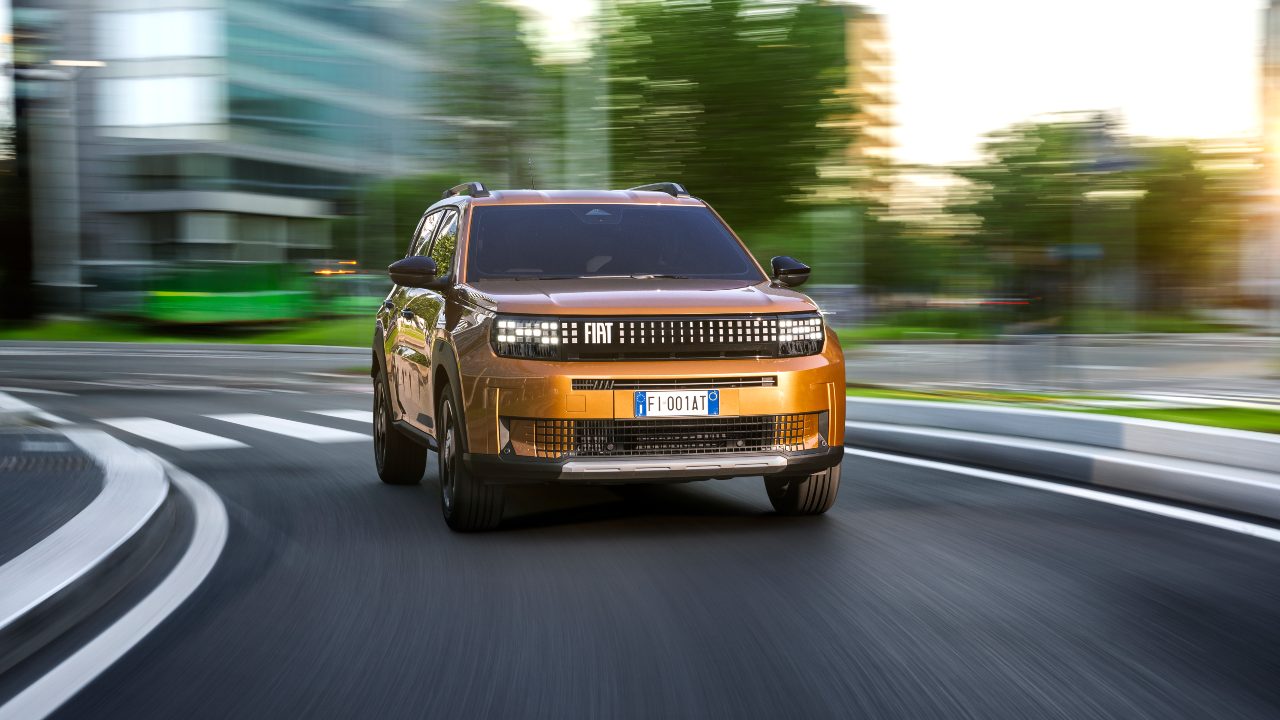 Orange Fiat Grande Panda Exterior Front Driving