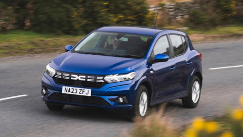 Blue Dacia Sandero Driving
