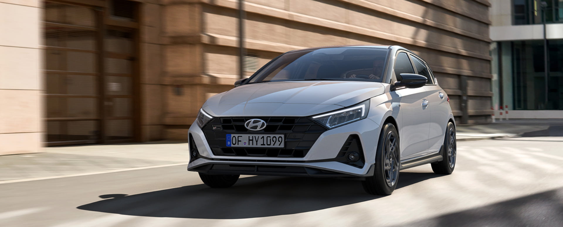 White Hyundai i20 Driving