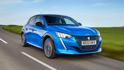 Blue Peugeot 208 Driving