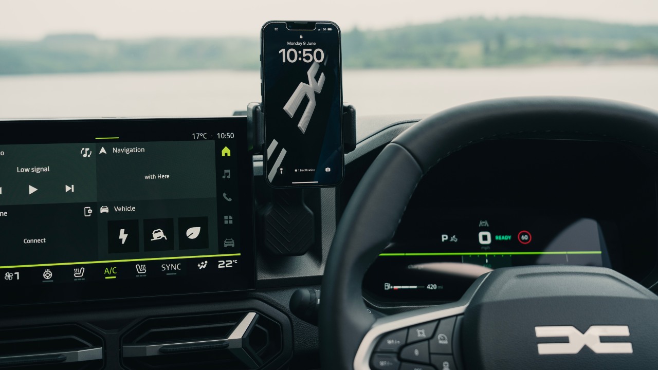 Dacia interior infotainment screen with a phone connected