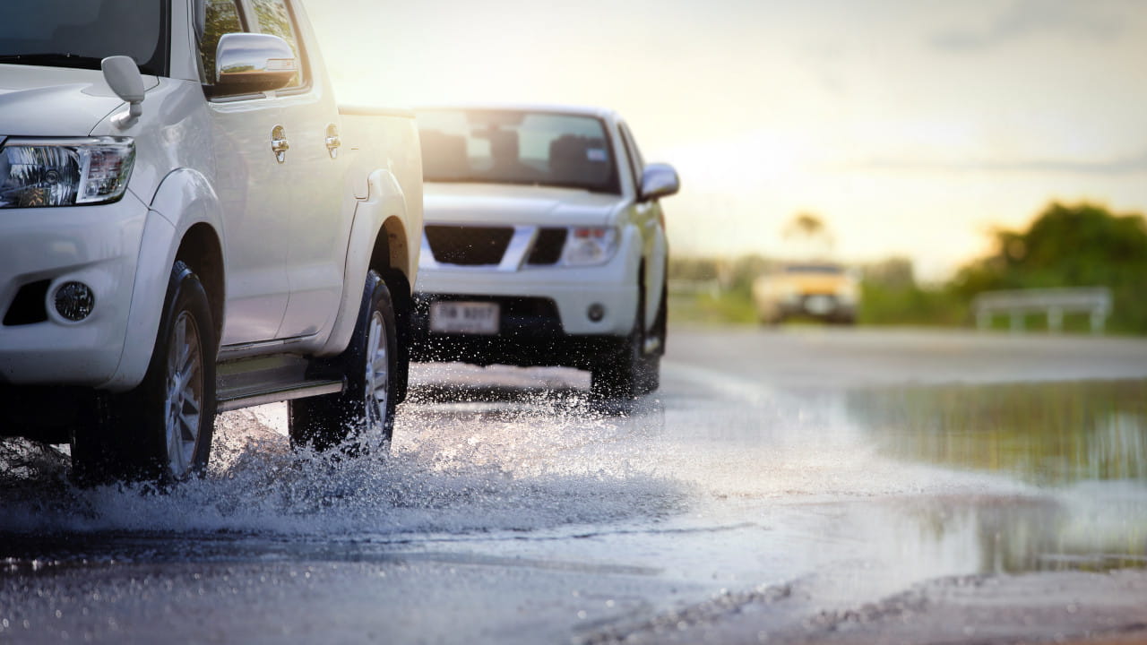 Car Driving Through Water