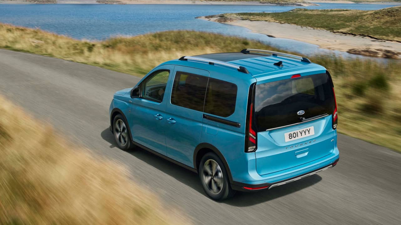 Blue Ford Tourneo Connect Exterior Rear Driving on Coastal Road