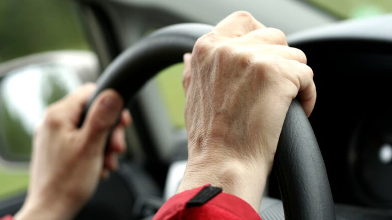 Palms on Steering Wheel Driving