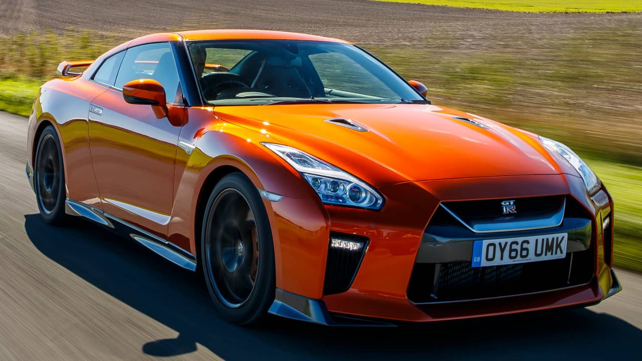 Nissan GT-R in Orange Driving Front Angle