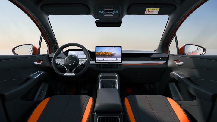 BYD Dolphin G DM‑i interior with touchscreen, steering wheel and two-tone seats