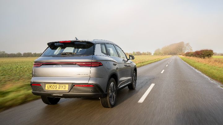 Grey BYD SEALION 5 DM-i country road driving