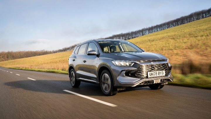 Grey BYD SEALION 5 DM-i driving country road front
