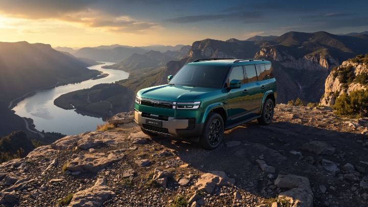 BYD Ti7 DM-p green static at the top of a mountain