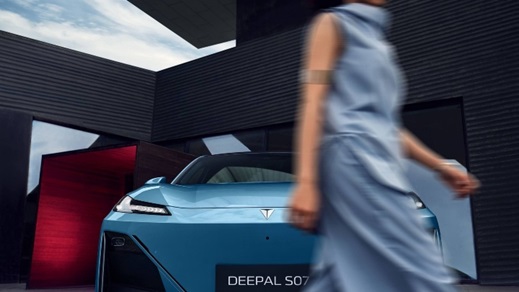 Changan Deepal S07 electric SUV parked outside modern architecture with a pedestrian passing