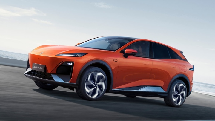 Orange Changan Deepal S07 electric SUV driving at speed on an open road