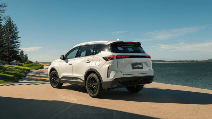 White Chery Tiggo 7 Parked by the Sea Rear View