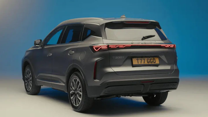 Grey Chery Tiggo 7 Rear Angle Blue and Grey Backdrop