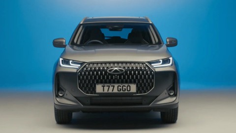 Grey Chery Tiggo 7 Front View Blue and Grey Backdrop