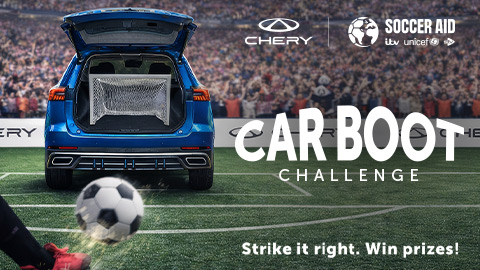 Football Flying Towards Chery Vehicle With Boot Open on Football Pitch